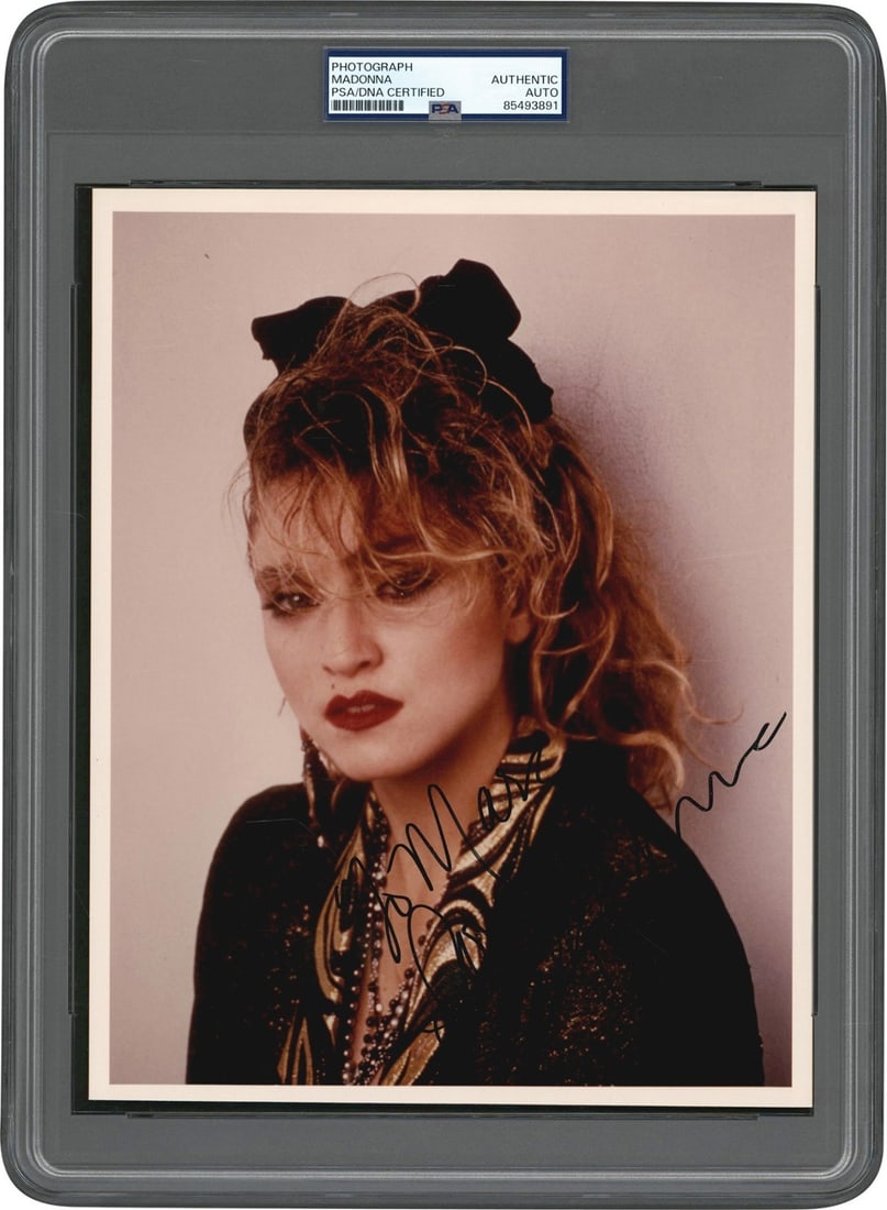 Madonna Signed 8x10 Desperately Seeking Susan Photo PSA DNA Certified: Madonna Signed 8x10 Desperately Seeking Susan Photo PSA DNA Certified This original 8x10 photograph features Madonna in her iconic role from the hit film "Desperately Seeking Susan." The image is sign