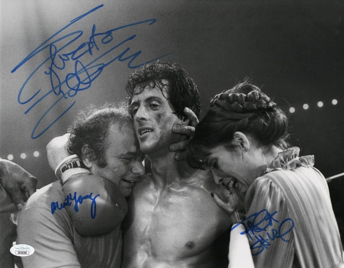 Sylvester Stallone Talia Shire Signed 11x14 Photo Rocky JSA Authenticated: Sylvester Stallone Talia Shire Signed 11x14 Photo Rocky JSA Authenticated This 11x14 photograph features autographs from iconic actors Sylvester Stallone, Talia Shire, and Burt Young, celebrating thei