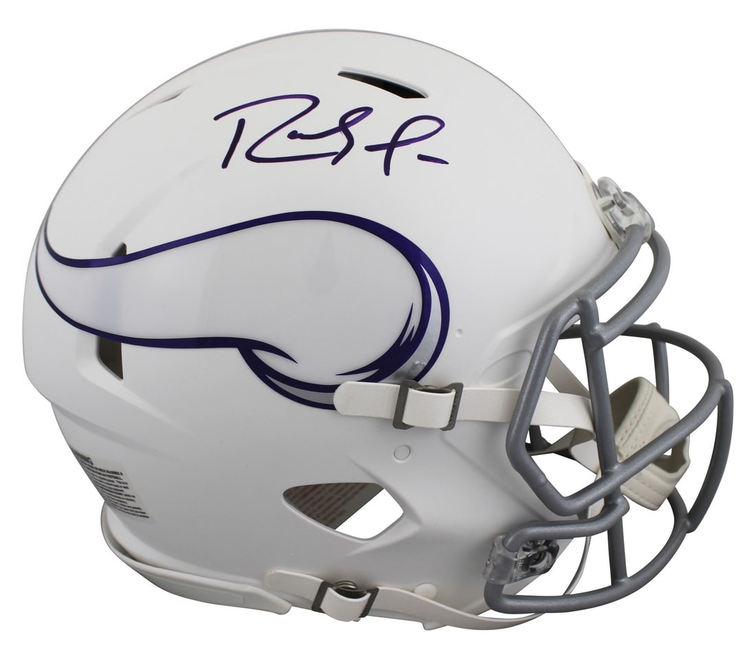 Randy Moss Signed 2024 Vikings Full Size Speed Proline Helmet BAS Authenticated: Randy Moss Signed 2024 Vikings Full Size Speed Proline Helmet BAS Authenticated This authentic Minnesota Vikings helmet has been personally signed by Randy Moss, the legendary wide receiver. The 2024 