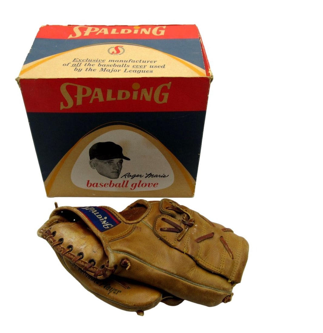 1960s Spalding Roger Maris Model Baseball Glove with Original Box: 1960s Spalding Roger Maris Model Baseball Glove with Original Box This rare 1960s Roger Maris Spalding baseball glove and box set is a must-have for any baseball enthusiast or collector. The glove is 