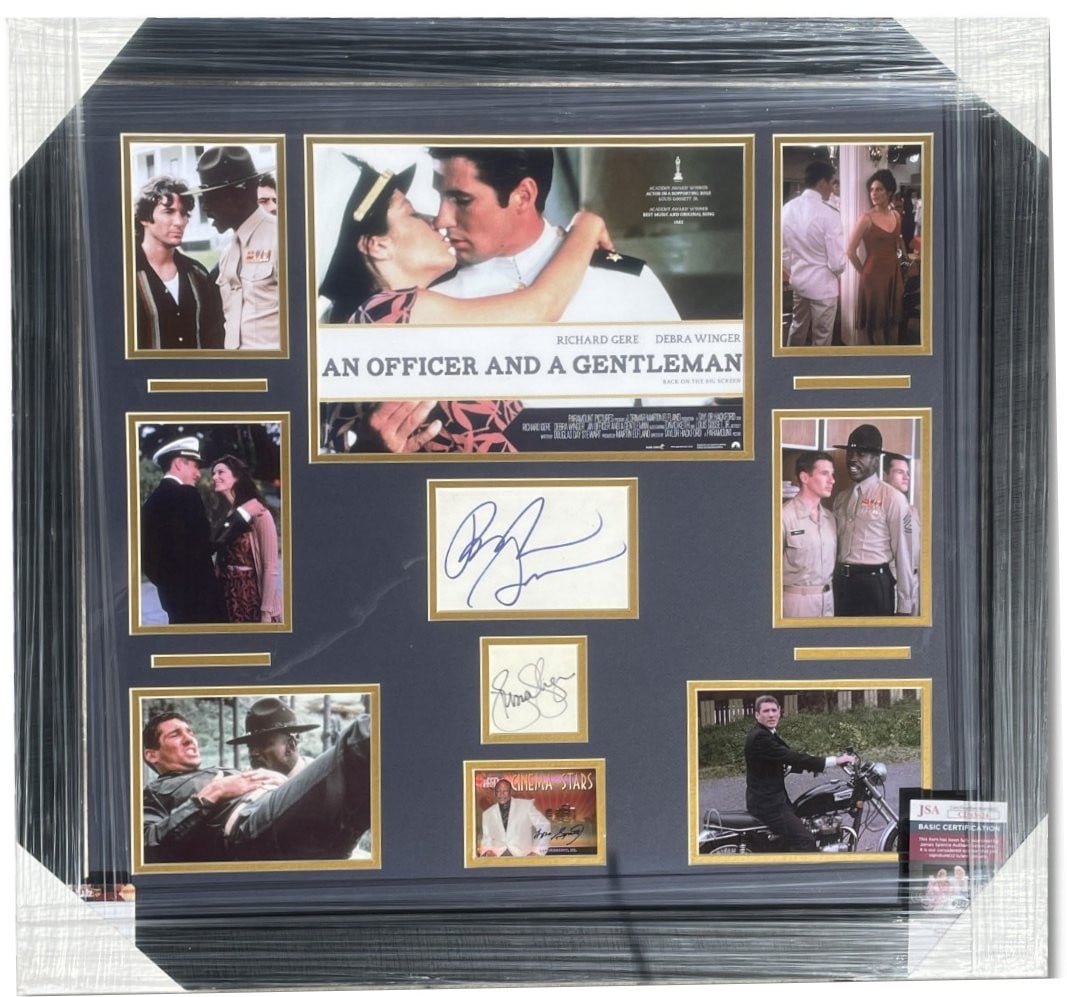 Custom Framed An Officer and a Gentleman Cast Autograph Cuts JSA Authenticated: Custom Framed An Officer and a Gentleman Cast Autograph Cuts JSA Authenticated This is a custom-framed display featuring autographed cuts and a card from the film "An Officer and a Gentleman." The sig