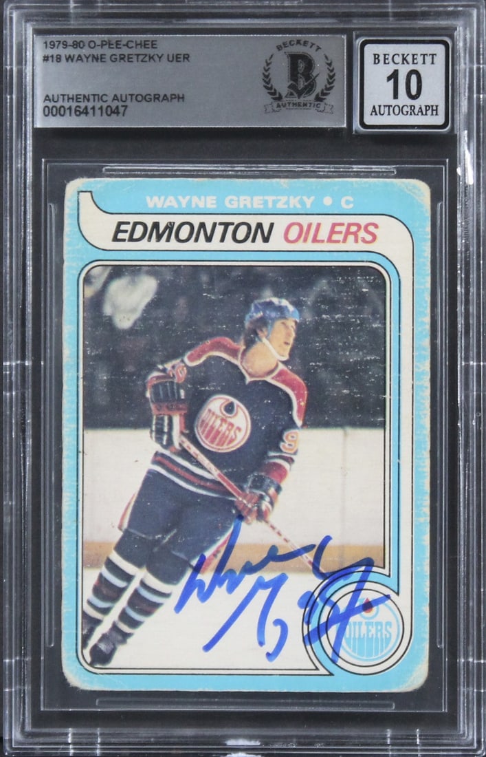 Wayne Gretzky signed 1979 O Pee Chee rookie card BAS 10 slab: Wayne Gretzky signed 1979 O Pee Chee rookie card BAS 10 slab This is an original 1979 O-Pee-Chee #18 rookie card featuring Wayne Gretzky of the Edmonton Oilers. The card has been personally signed by 