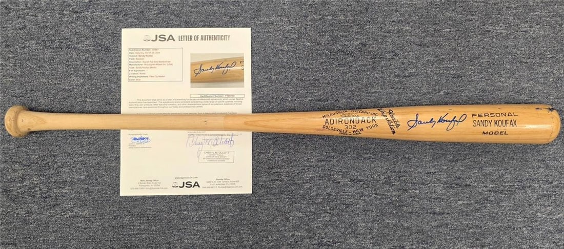 Baseball Bat Autographed by Sandy Koufax with JSA Authentication: Baseball Bat Autographed by Sandy Koufax with JSA Authentication This is a professional player model bat signed by Sandy Koufax, legendary pitcher for the Dodgers. The autograph is authenticated by Ja