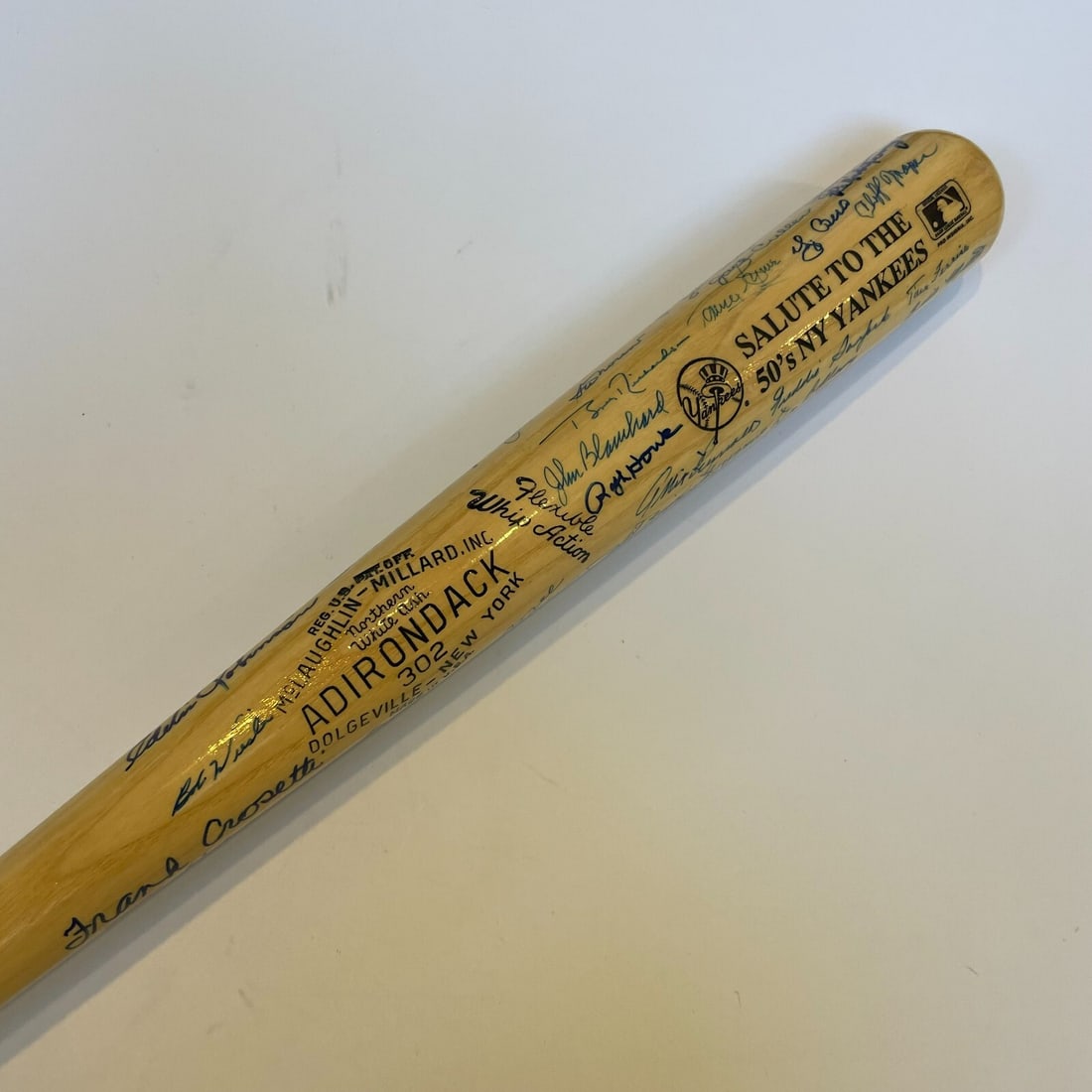 1950s New York Yankees Multi-Signed 34in Baseball Bat 50+ Autographs: 1950s New York Yankees Multi-Signed 34in Baseball Bat 50+ Autographs Commemorate the legendary 1950s New York Yankees with this multi-signed baseball bat. This original Adirondack bat measures 34 inch