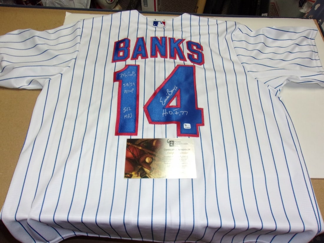 Signed Majestic Jersey by Ernie Banks with GAI COA Mr Cub Cubs HOF 77: Signed Majestic Jersey by Ernie Banks with GAI COA Mr Cub Cubs HOF 77 This is an official licensed Majestic jersey signed by Ernie Banks, featuring his association with the Chicago Cubs and Hall of Fa