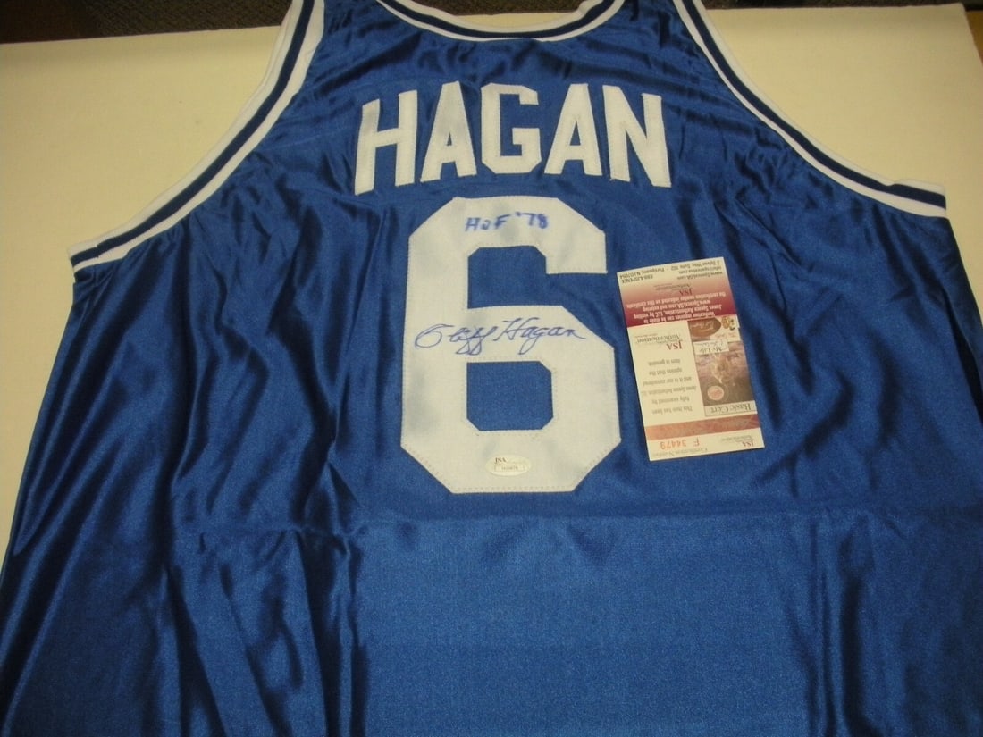 Cliff Hagan Autographed Kentucky Wildcats Basketball Jersey JSA COA: Cliff Hagan Autographed Kentucky Wildcats Basketball Jersey JSA COA This is a pre-owned Kentucky Wildcats basketball jersey signed by Cliff Hagan, a Hall of Fame inductee in 1978. The jersey is an ori