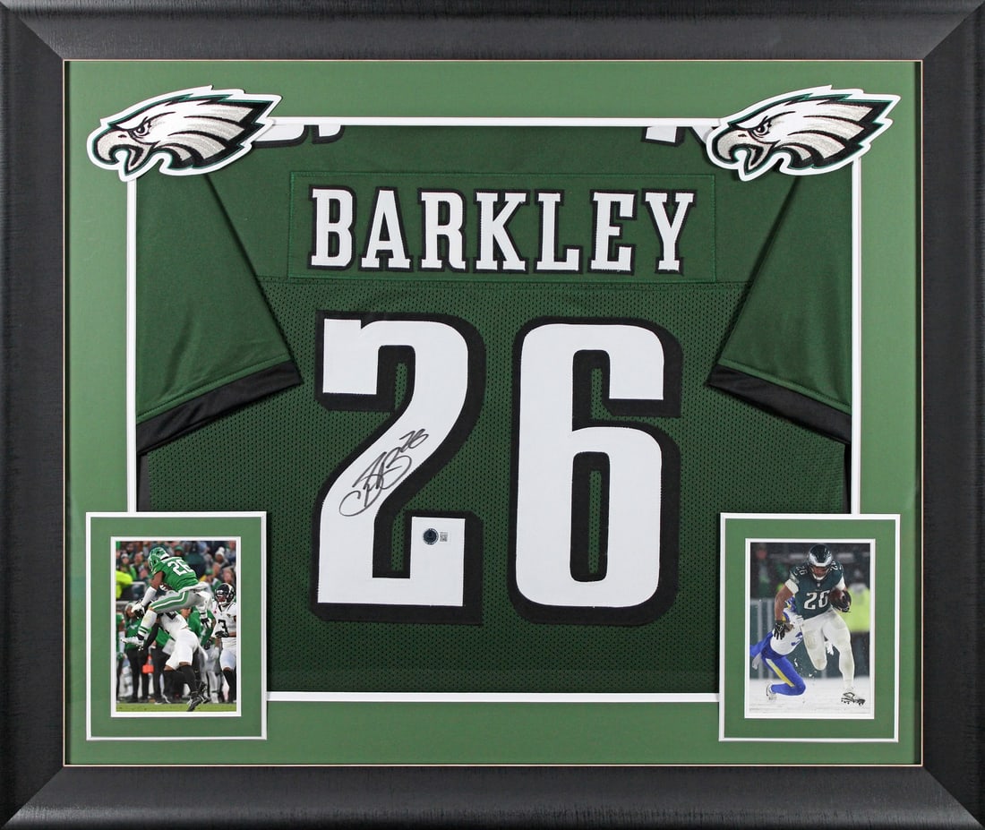 Framed Green Jersey Signed by Saquon Barkley with Beckett Witness Authentication: Framed Green Jersey Signed by Saquon Barkley with Beckett Witness Authentication This green Pro Style jersey has been personally signed by Saquon Barkley of the Philadelphia Eagles. The jersey is prof