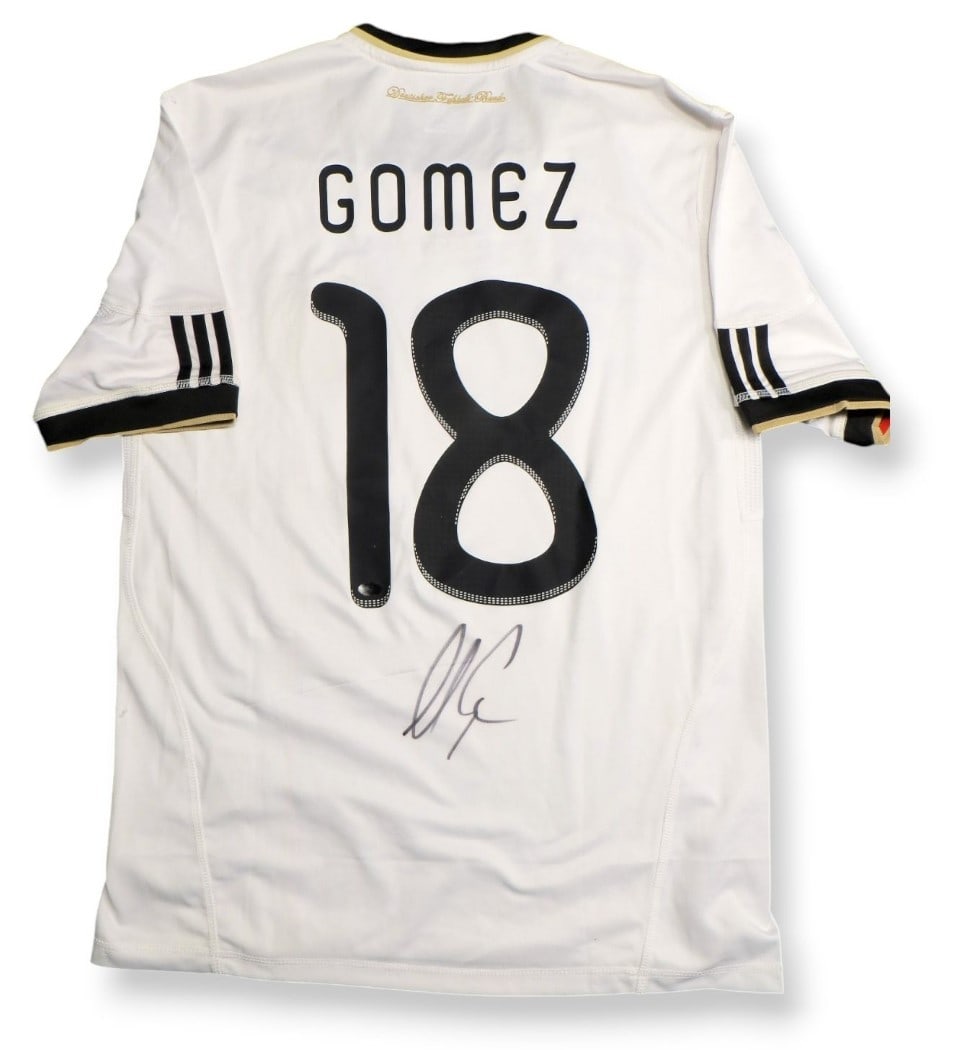 Mario Gomez Team Germany Signed Jersey Beckett Authenticated: Mario Gomez Team Germany Signed Jersey Beckett Authenticated This is an authentic, pre-owned jersey signed by soccer player Mario Gomez, representing Team Germany. The jersey is size M and comes with 