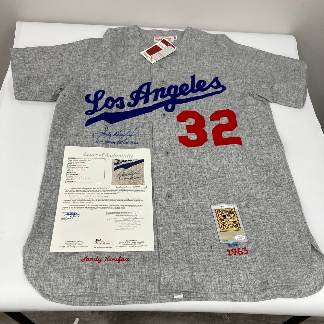Sandy Koufax Signed Dodgers Jersey 4 No Hitters JSA Authenticated: Sandy Koufax Signed Dodgers Jersey 4 No Hitters JSA Authenticated Celebrate the legacy of Sandy Koufax with this authentic Los Angeles Dodgers Mitchell & Ness gray away jersey, signed and inscribed by