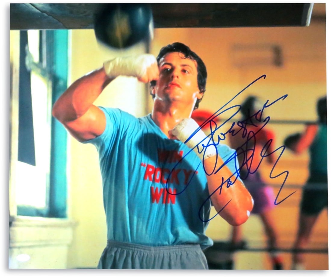 Sylvester Stallone Signed 20x24 Rocky Balboa Photo JSA Authenticated: Sylvester Stallone Signed 20x24 Rocky Balboa Photo JSA Authenticated This iconic 20X24 photograph features a stunning autographed image of Sylvester Stallone as Rocky Balboa. The signature is authenti