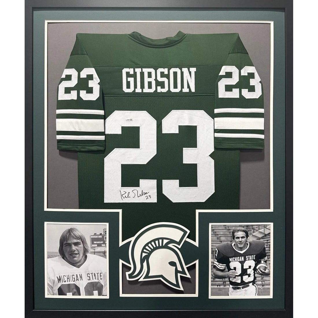 JSA Authenticated Framed Kirk Gibson Michigan State Signed Jersey: JSA Authenticated Framed Kirk Gibson Michigan State Signed Jersey This is a framed Michigan State jersey autographed by Kirk Gibson, commemorating his time playing football at MSU before his baseball 