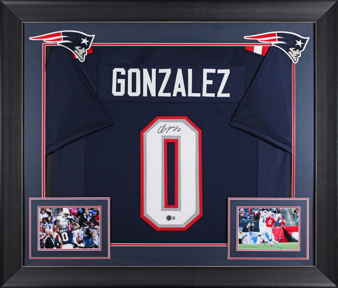 Framed Christian Gonzalez Signed Patriots Jersey Navy Blue Beckett Authenticated: Framed Christian Gonzalez Signed Patriots Jersey Navy Blue Beckett Authenticated This professionally framed navy blue Pro Style jersey has been personally signed by Christian Gonzalez of the New Engla