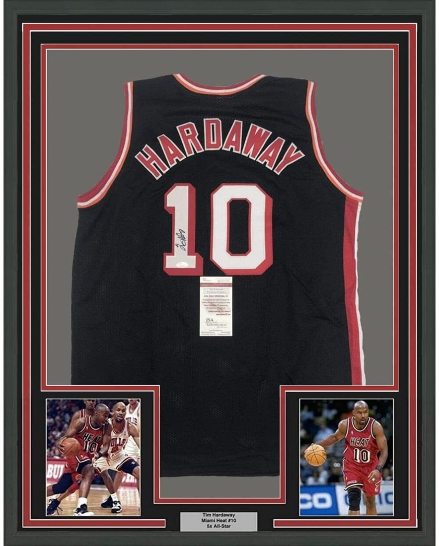 Framed Tim Hardaway signed Miami Heat jersey with two 8x10 photos JSA COA: Framed Tim Hardaway signed Miami Heat jersey with two 8x10 photos JSA COA This professionally framed and matted Miami Heat black jersey is autographed by Tim Hardaway. The display includes two 8x10 ph