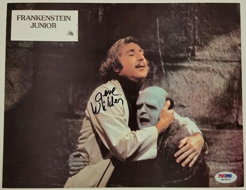 Young Frankenstein 8.5x11 Lobby Card Signed by Gene Wilder With PSA/DNA COA: Young Frankenstein 8.5x11 Lobby Card Signed by Gene Wilder With PSA/DNA COA This is an original 8.5x11 lobby card from the film 'Young Frankenstein,' signed by Gene Wilder. The autograph is authentica