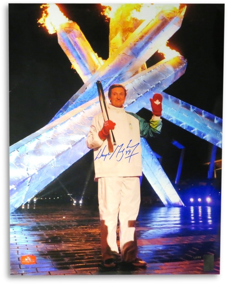 2010 Olympics 16x20 Photo Hand Signed by Wayne Gretzky with Authentication: 2010 Olympics 16x20 Photo Hand Signed by Wayne Gretzky with Authentication This is an original 16x20 photograph autographed by Wayne Gretzky in blue ink. The photo commemorates the 2010 Olympics and i
