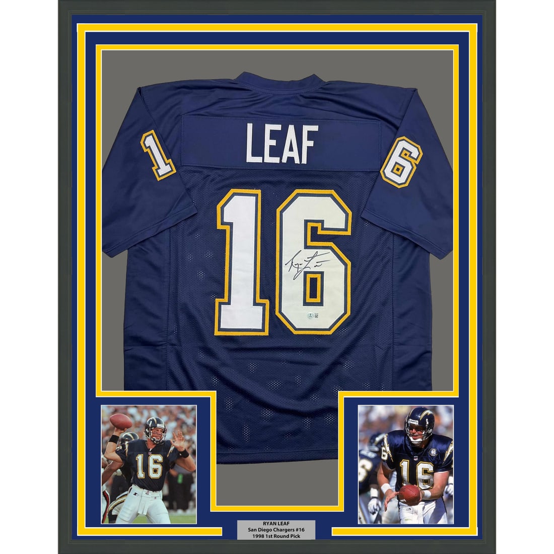 Ryan Leaf Signed Dark Blue Chargers Jersey 35x39 Framed Beckett COA: Ryan Leaf Signed Dark Blue Chargers Jersey 35x39 Framed Beckett COA This professionally framed and matted San Diego Chargers dark blue jersey is autographed by Ryan Leaf. The display includes two 5x7 