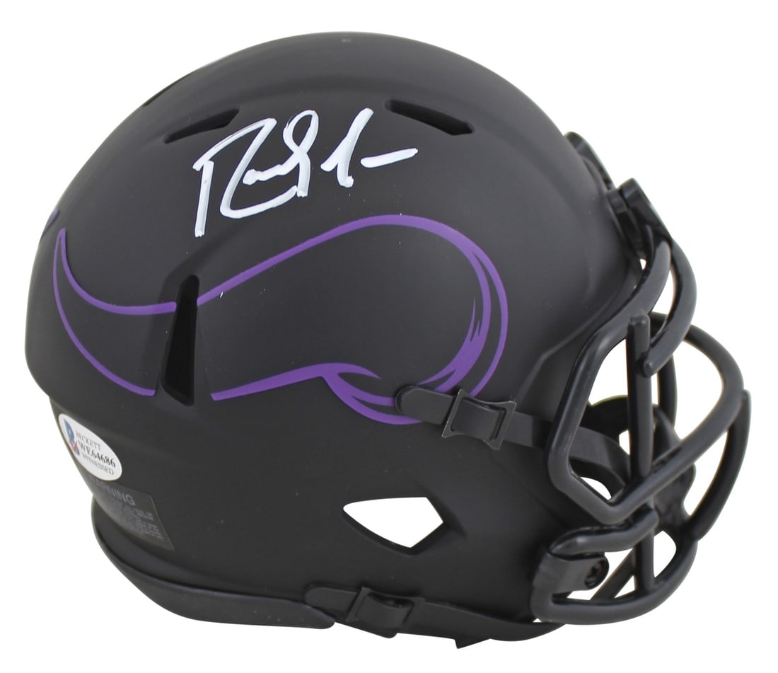 Randy Moss Signed Eclipse Speed Mini Helmet Minnesota Vikings BAS Authenticated: Randy Moss Signed Eclipse Speed Mini Helmet Minnesota Vikings BAS Authenticated This authentic signed Eclipse Speed Mini Helmet features the legendary Randy Moss of the Minnesota Vikings. The helmet i