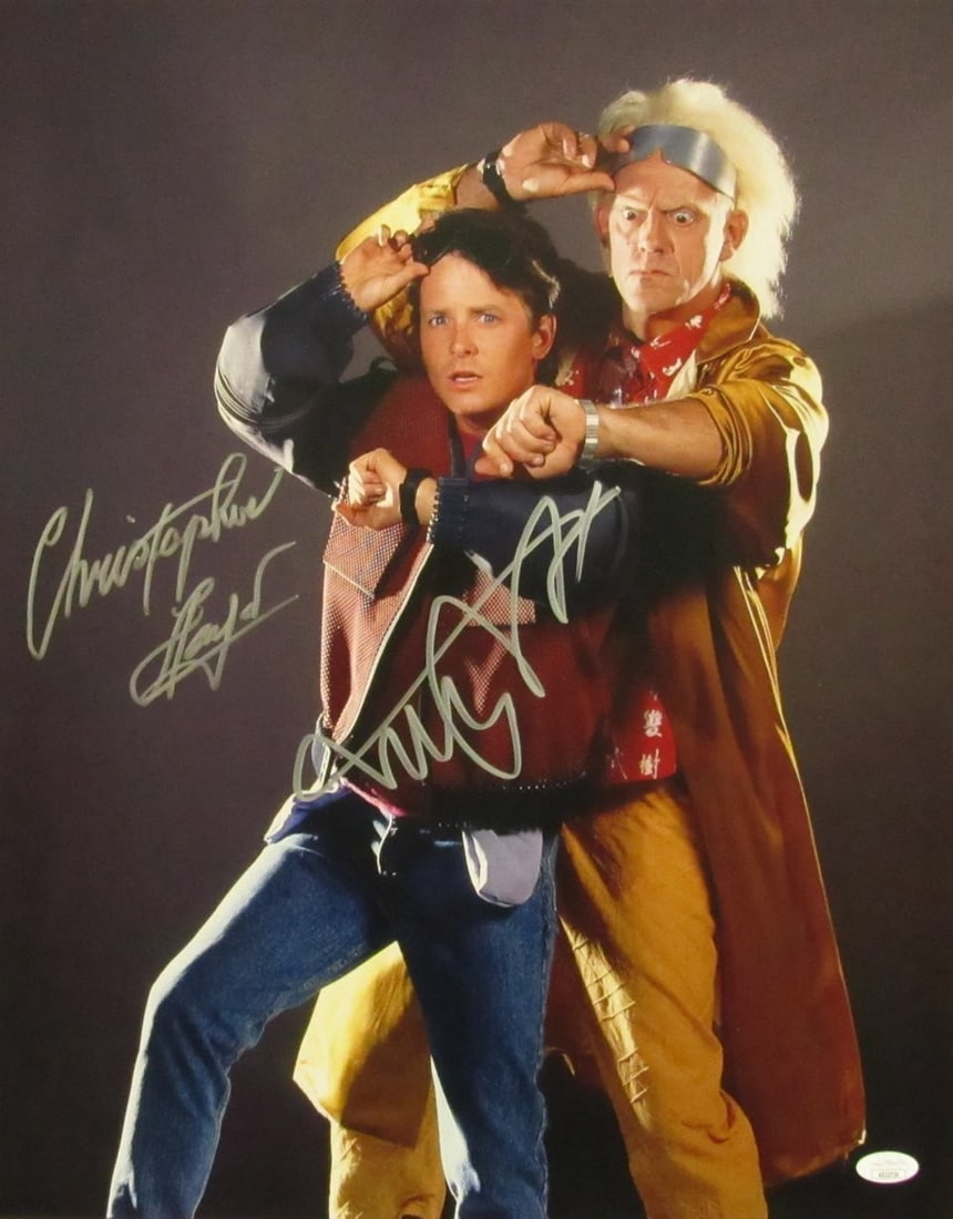 Michael J Fox Christopher Lloyd Autographed 16x20 Photo Back to the Future JSA Certified: Michael J Fox Christopher Lloyd Autographed 16x20 Photo Back to the Future JSA Certified This is an authentic autographed 16x20 photo from the iconic film "Back to the Future," featuring the