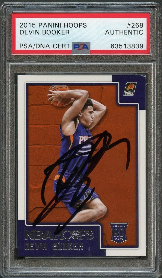 PSA authenticated Devin Booker rookie autograph 2015-16 NBA Hoops card #268: PSA authenticated Devin Booker rookie autograph 2015-16 NBA Hoops card #268 This is a 2015-16 NBA Hoops #268 rookie card featuring Devin Booker of the Phoenix Suns. The card is autographed by Devin Bo