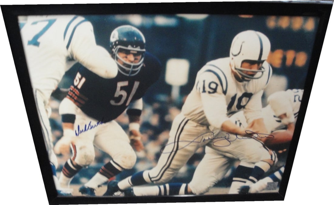 Autographed 16X20 Photo Johnny Unitas Dick Butkus Colts Bears: Autographed 16X20 Photo Johnny Unitas Dick Butkus Colts Bears This is an original 16x20 photograph custom framed and autographed by Johnny Unitas and Dick Butkus. The photo features both sports legend