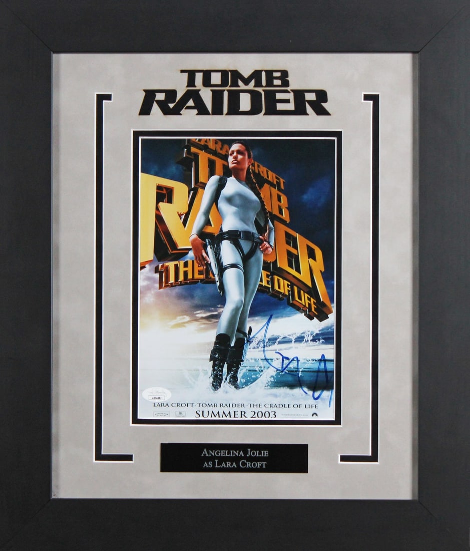 Framed 8x10 signed photo Angelina Jolie Tomb Raider JSA authenticated: Framed 8x10 signed photo Angelina Jolie Tomb Raider JSA authenticated Authentic signed Tomb Raider 8x10 framed photo personally signed by Angelina Jolie. Includes JSA authentication and COA/hologram. 