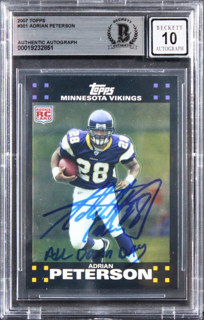 Adrian Peterson Signed 2007 Topps Rookie Card Beckett 10 Slab With All Damn Day Inscription: Adrian Peterson Signed 2007 Topps Rookie Card Beckett 10 Slab With All Damn Day Inscription This is an original 2007 Topps #301 rookie card featuring Adrian Peterson of the Minnesota Vikings. The card