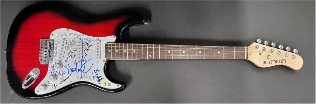 True Blood Cast Signed Electric Guitar Beckett Authenticated Autographs: True Blood Cast Signed Electric Guitar Beckett Authenticated Autographs This pre-owned electric guitar is signed by 14 cast members from the television series True Blood, including Stephen Moyer and A