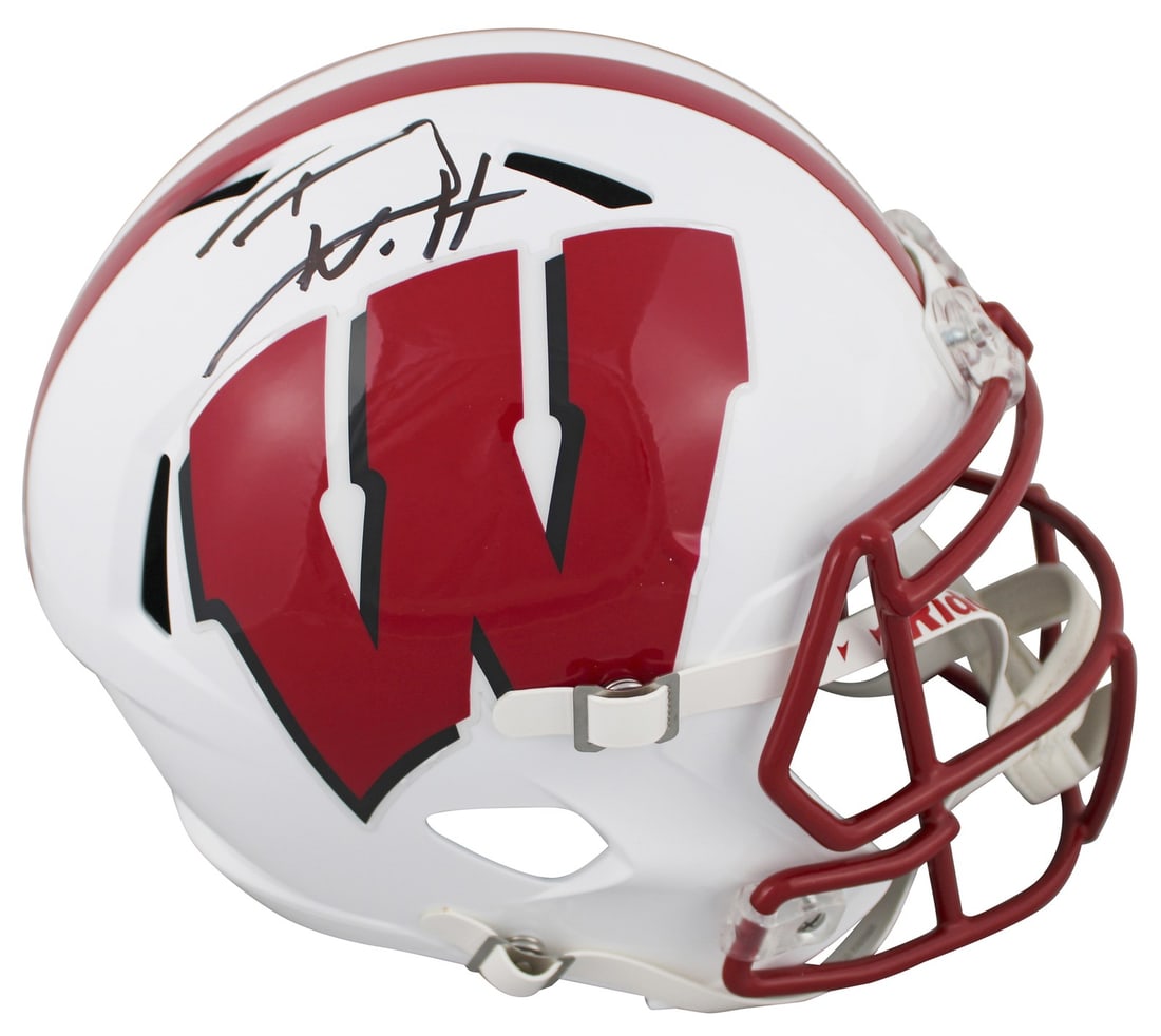 T.J. Watt Signed Wisconsin Badgers Full Size Helmet with BAS Authentication: T.J. Watt Signed Wisconsin Badgers Full Size Helmet with BAS Authentication This authentic signed full-size Riddell Speed Rep helmet is a must-have for any Wisconsin Badgers fan. Personally signed by 