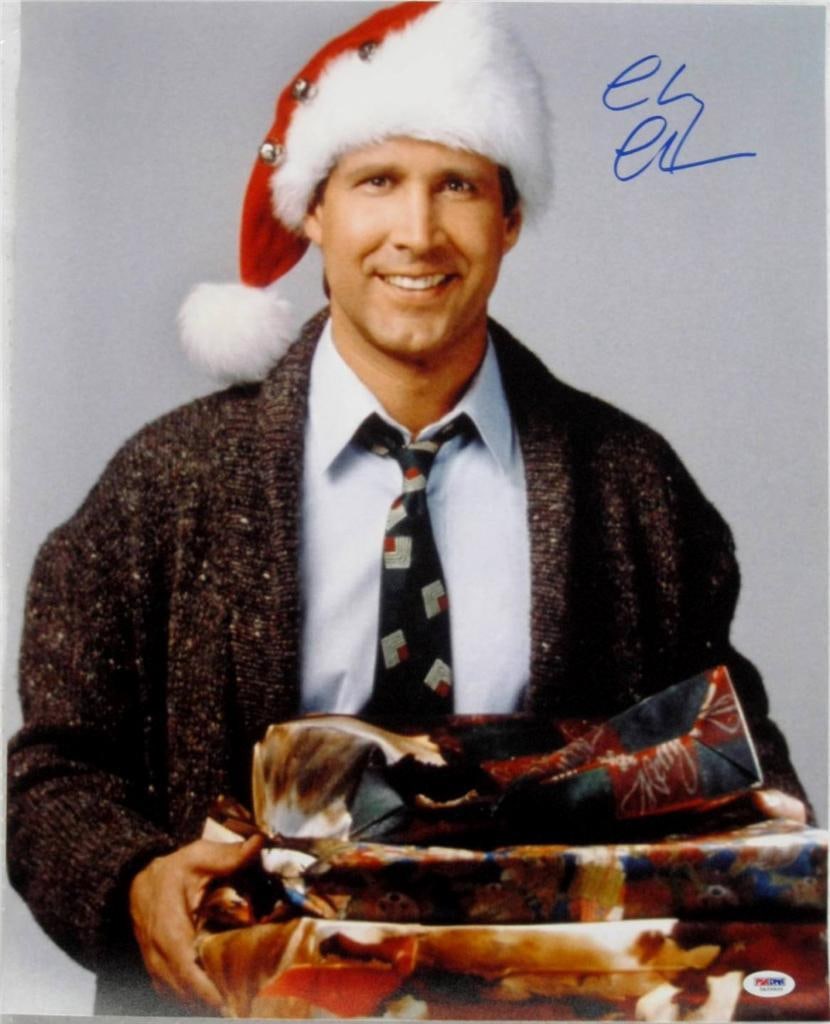 Chevy Chase Autographed 16x20 Photo from Christmas Vacation with PSA Authentication: Chevy Chase Autographed 16x20 Photo from Christmas Vacation with PSA Authentication This is an original 16x20 photograph from National Lampoon's Christmas Vacation, signed by Chevy Chase. The photogra