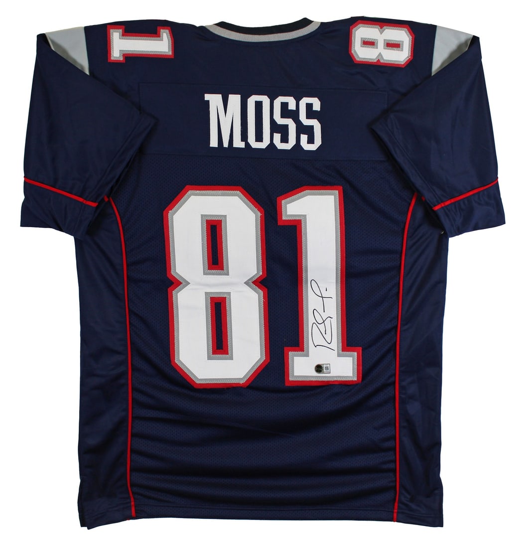 Randy Moss Signed Patriots Navy Pro Style Jersey BAS Witnessed: Randy Moss Signed Patriots Navy Pro Style Jersey BAS Witnessed Authentic Randy Moss signed navy blue pro style jersey from his time with the New England Patriots. This original autographed piece is a 