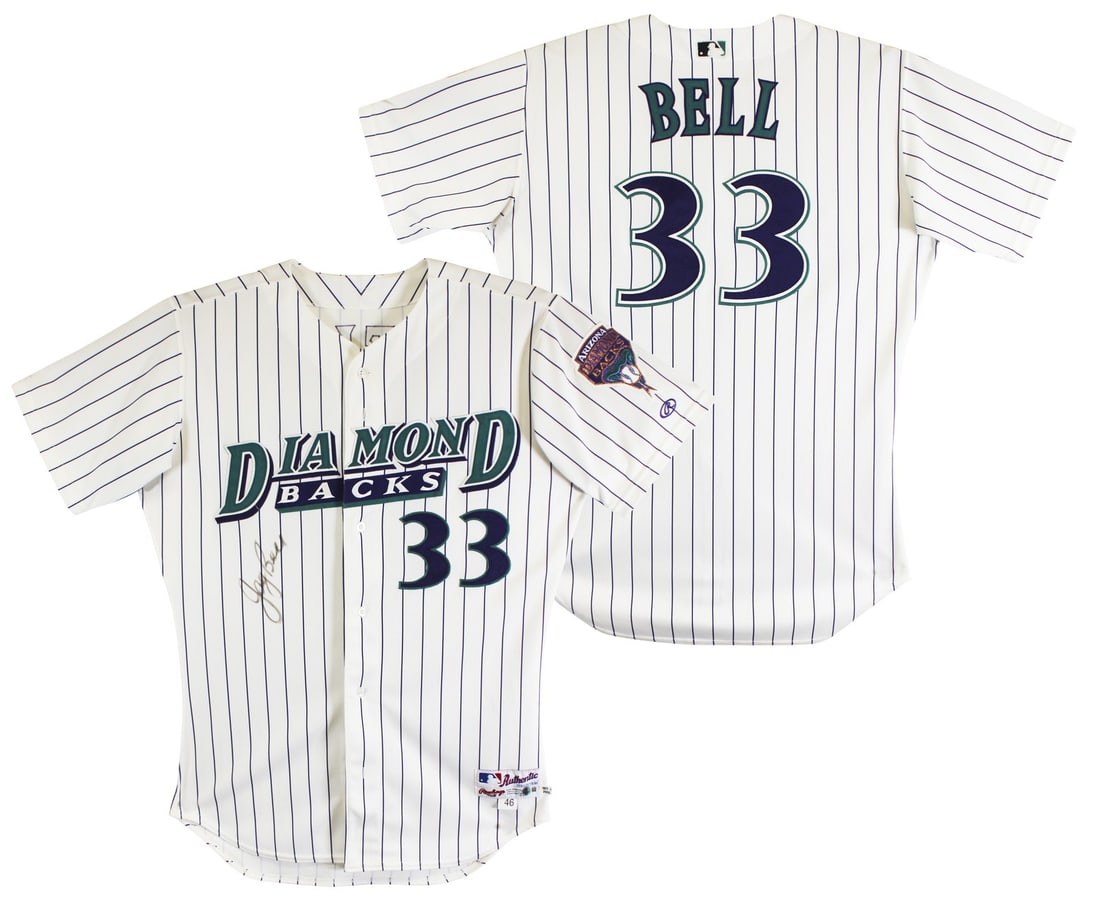 Jay Bell Autographed Arizona Diamondbacks Pinstripe Jersey Beckett Authenticated: Jay Bell Autographed Arizona Diamondbacks Pinstripe Jersey Beckett Authenticated This is an original Arizona Diamondbacks white pinstripe Rawlings jersey, size 46, personally signed by Jay Bell. The j