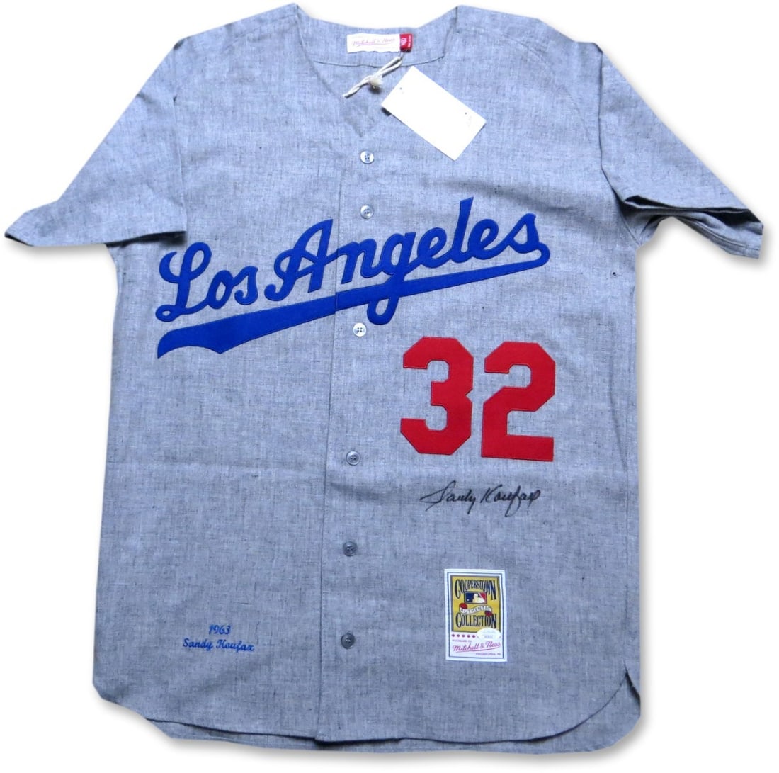 Sandy Koufax Signed Dodgers Mitchell & Ness Jersey 1963 JSA Authenticated: Sandy Koufax Signed Dodgers Mitchell & Ness Jersey 1963 JSA Authenticated This is a Mitchell & Ness jersey signed by legendary baseball player Sandy Koufax. The jersey, representing the Los Angeles Do