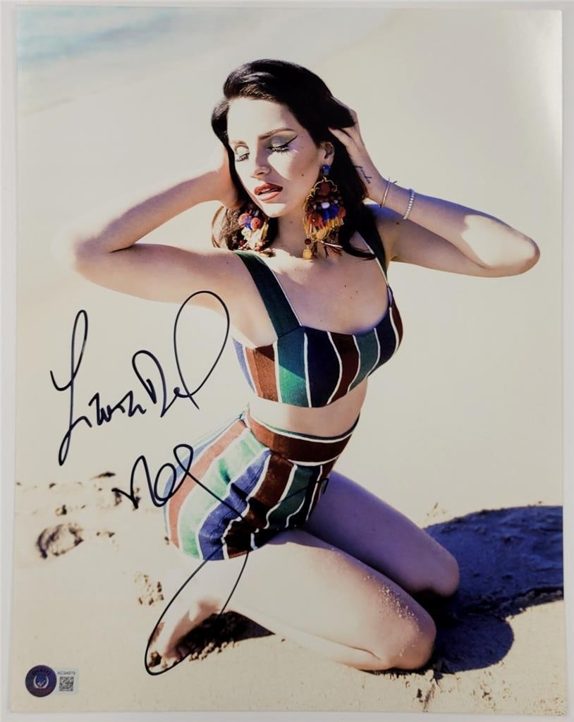 11x14 autograph photo of Lana Del Rey with JSA PSA PSA/DNA authentication: 11x14 autograph photo of Lana Del Rey with JSA PSA PSA/DNA authentication This is an original 11x14 photograph signed by singer Lana Del Rey, featuring her full autograph. The signature has been authe