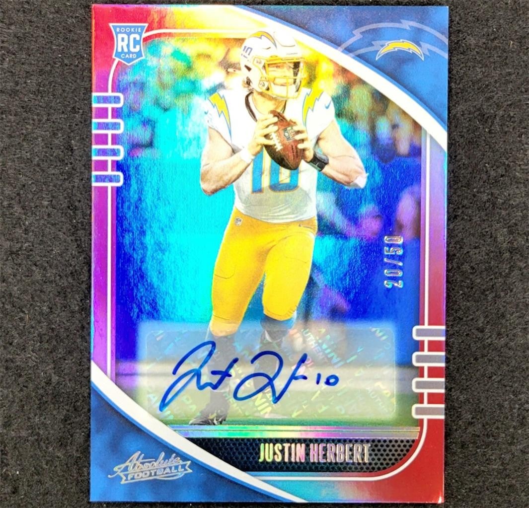 2020 Panini Absolute Justin Herbert Red Spectrum Rookie Card Auto /50: 2020 Panini Absolute Justin Herbert Red Spectrum Rookie Card Auto /50 This 2020 Panini Absolute Justin Herbert Red Spectrum #167 rookie card is a must-have for football enthusiasts and collectors alik