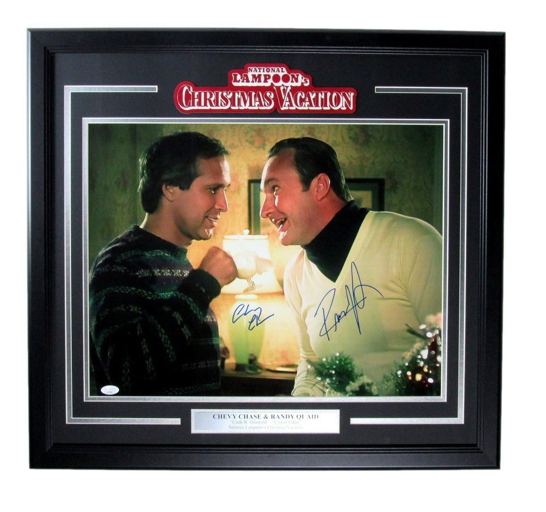 Chevy Chase Randy Quaid Dual Autographed 16x20 Christmas Vacation Photo Framed JSA: Chevy Chase Randy Quaid Dual Autographed 16x20 Christmas Vacation Photo Framed JSA This stunning framed dual-autographed 16x20 photo features Chevy Chase as "Clark Griswold" and Randy Quaid as "Cousin