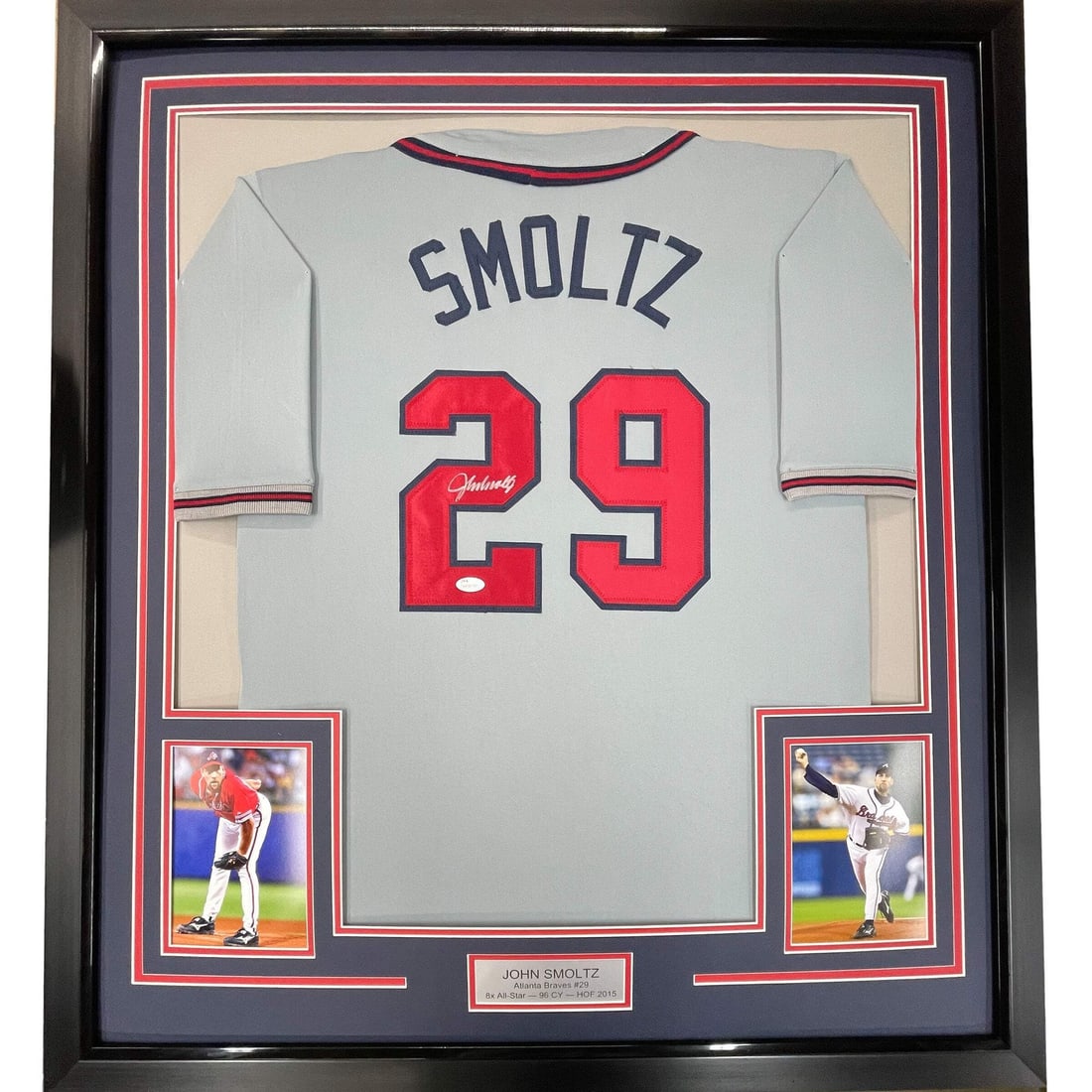 Framed John Smoltz signed Atlanta Braves grey jersey JSA COA 33x42: Framed John Smoltz signed Atlanta Braves grey jersey JSA COA 33x42 This professionally framed and matted Atlanta Braves grey baseball jersey features the authentic autograph of John Smoltz. The displa