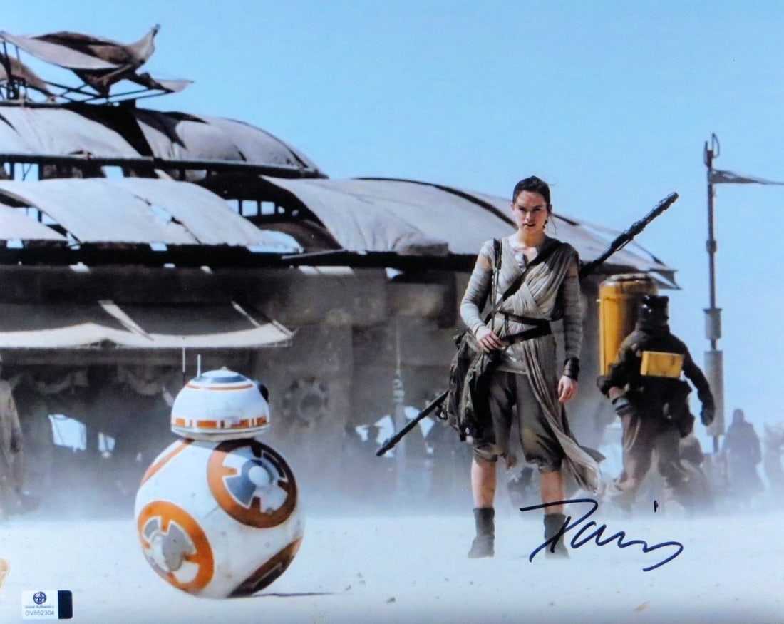 Daisy Ridley Signed 11x14 Star Wars Photo with GAI Authentication: Daisy Ridley Signed 11x14 Star Wars Photo with GAI Authentication This stunning 11X14 photograph of Daisy Ridley, featuring her iconic role in Star Wars: The Force Awakens, is a must-have for any fan.