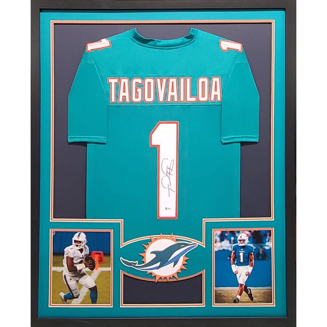 Tua Tagovailoa Autographed Framed Jersey with Beckett Authentication: Tua Tagovailoa Autographed Framed Jersey with Beckett Authentication This is a stunning framed jersey of Tua Tagovailoa, showcasing his signature and authenticated by Beckett, a leader in sports memor