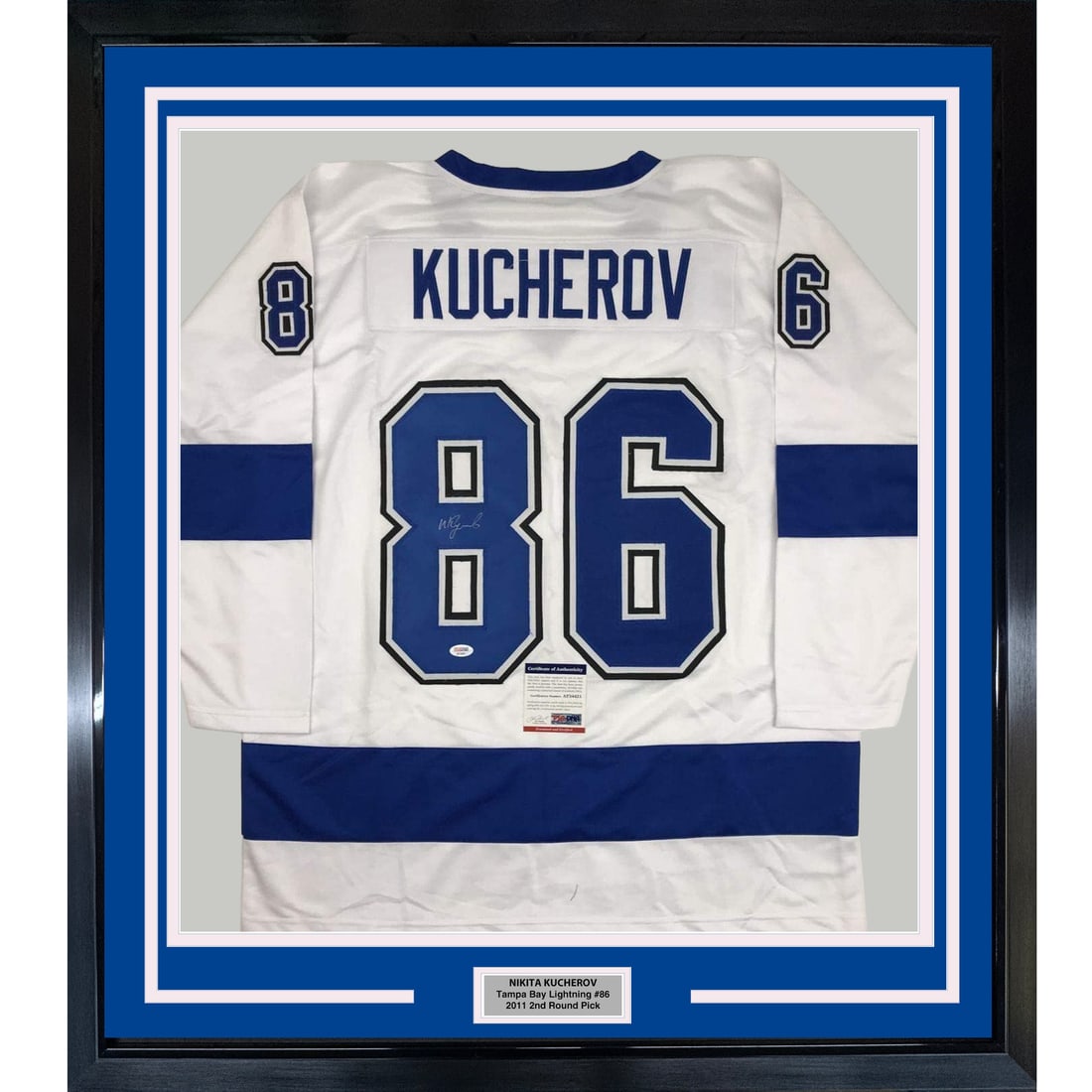 PSA Certified Framed Nikita Kucherov Tampa Bay Lightning Signed White Jersey: PSA Certified Framed Nikita Kucherov Tampa Bay Lightning Signed White Jersey Professionally framed and matted autographed Nikita Kucherov Tampa Bay white jersey. This original signed piece includes tw