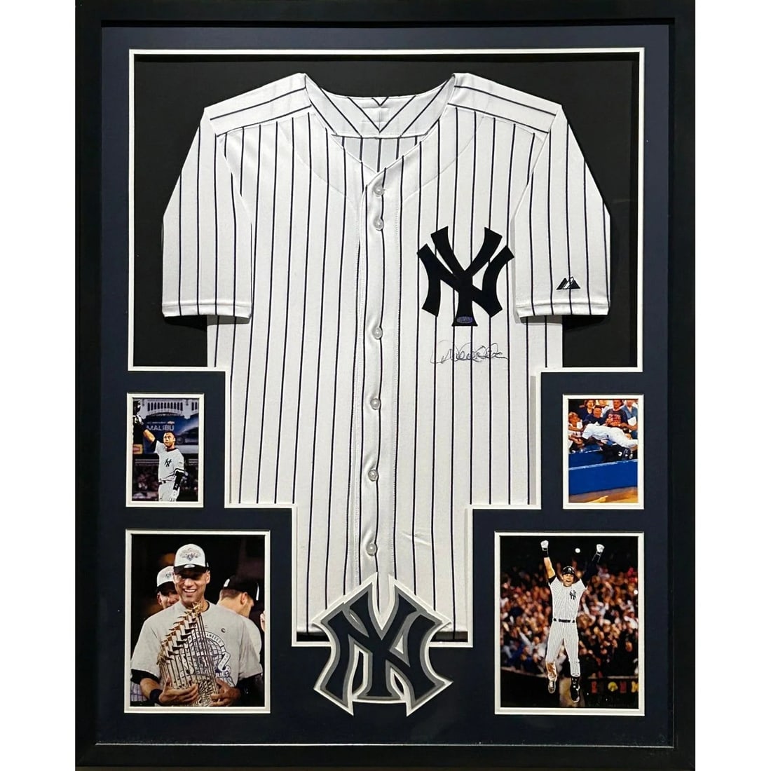 Derek Jeter Signed Framed Rookie Jersey Authenticated by Steiner: Derek Jeter Signed Framed Rookie Jersey Authenticated by Steiner This is a framed autographed rookie jersey of Derek Jeter, renowned for his exceptional career with the New York Yankees. Authenticated