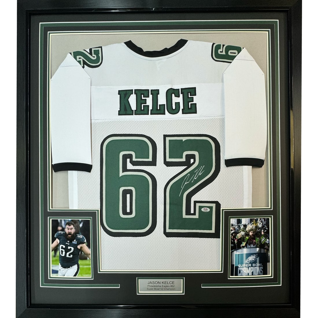 Jason Kelce Signed Framed Philadelphia Eagles Jersey PSA COA 35x39: Jason Kelce Signed Framed Philadelphia Eagles Jersey PSA COA 35x39 This professionally framed and matted display features a white Philadelphia Eagles jersey autographed by Jason Kelce. The piece inclu