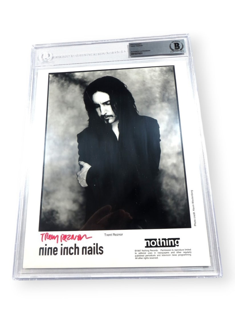 Trent Reznor Autographed 8X10 Photo Nine Inch Nails Beckett Authenticated: Trent Reznor Autographed 8X10 Photo Nine Inch Nails Beckett Authenticated This is an original 8x10 photograph of Trent Reznor, the iconic lead singer of Nine Inch Nails, featuring his authentic signat