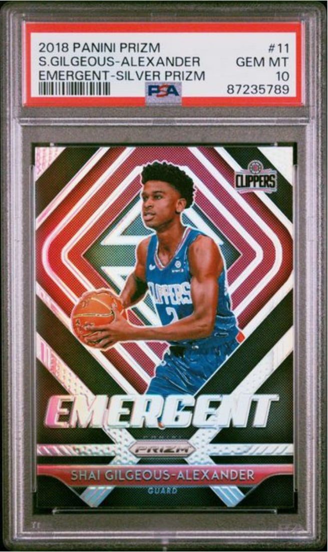 PSA 10 2018 Prizm Silver RC Shai Gilgeous-Alexander Basketball Card #11: PSA 10 2018 Prizm Silver RC Shai Gilgeous-Alexander Basketball Card #11 This is a 2018 Prizm Shai Gilgeous-Alexander #11 Silver Rookie Card, professionally graded and encapsulated by PSA with a grade 
