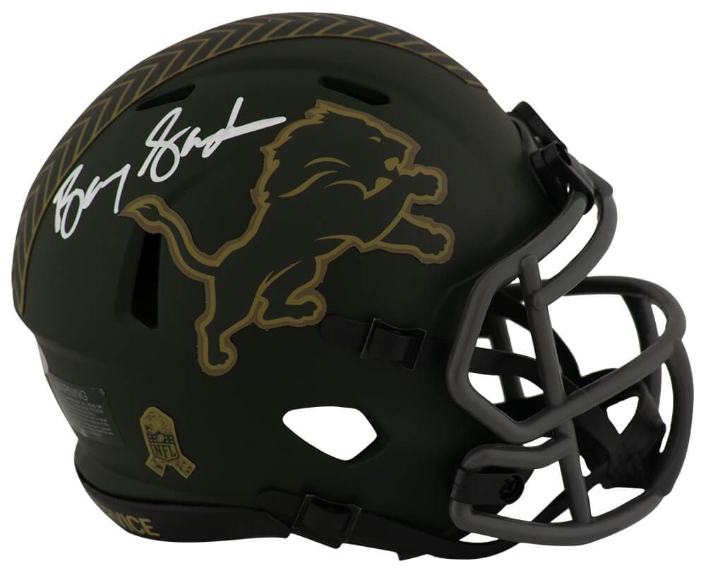 Detroit Lions 2025 Salute Mini Helmet Autographed by Barry Sanders: Detroit Lions 2025 Salute Mini Helmet Autographed by Barry Sanders This is a Barry Sanders signed Detroit Lions 2025 Salute Riddell Speed mini helmet. The helmet is autographed by the legendary NFL pl