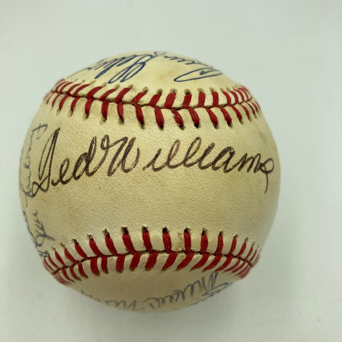 Ted Williams Multi Signed Red Sox Baseball with JSA Authentication: Ted Williams Multi Signed Red Sox Baseball with JSA Authentication This authentic multi-signed baseball features legendary Boston Red Sox player Ted Williams, along with other notable figures from the