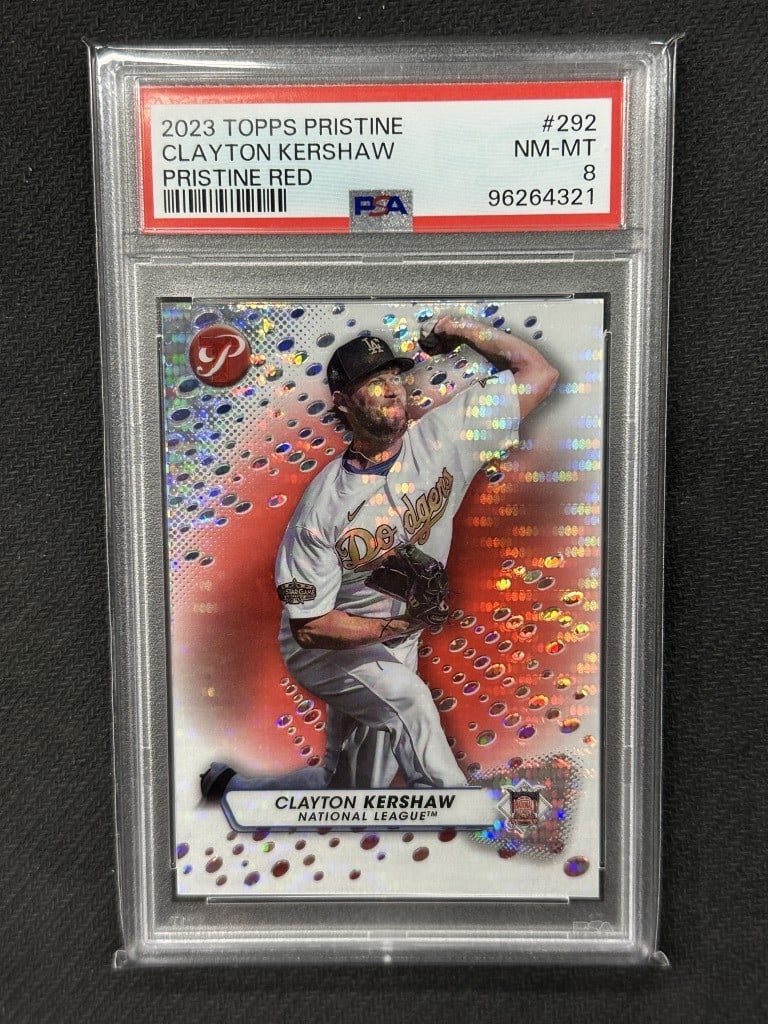 Clayton Kershaw 2023 Topps Pristine Red Refractor PSA 8 #292: Clayton Kershaw 2023 Topps Pristine Red Refractor PSA 8 #292 This is a 2023 Topps Pristine Red Refractor baseball card featuring Clayton Kershaw, a star player for the Los Angeles Dodgers. The card is