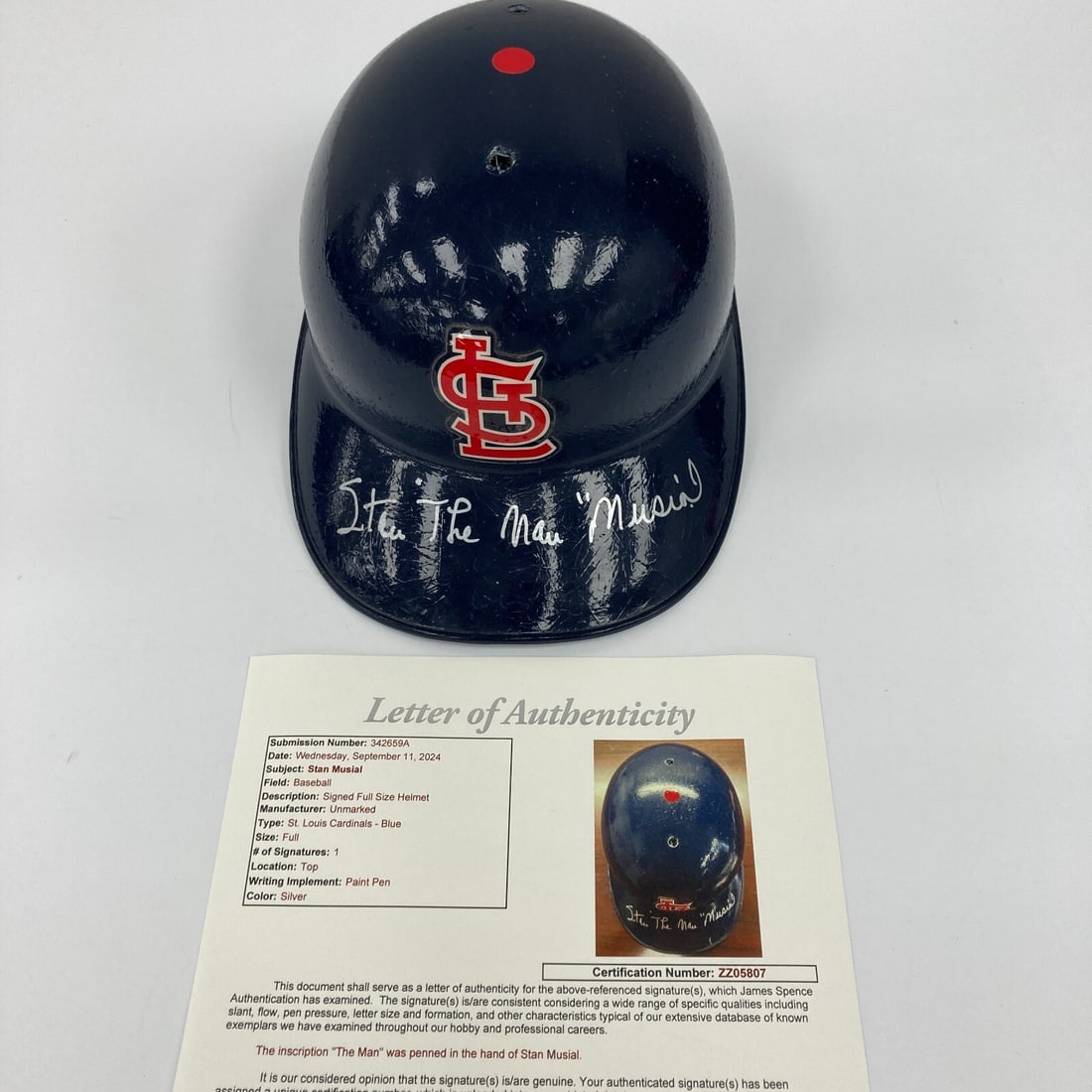 Stan Musial Signed St. Louis Cardinals Helmet with JSA COA: Stan Musial Signed St. Louis Cardinals Helmet with JSA COA This is an authentic signed St. Louis Cardinals batting helmet featuring the legendary Stan Musial's autograph. Musial, known as "The Man," p