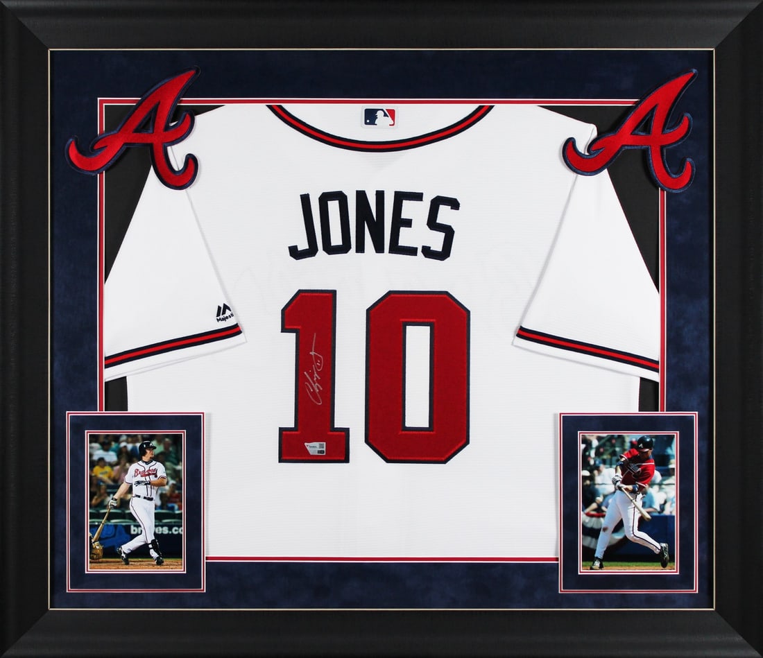 Chipper Jones Signed White Majestic Cool Base Framed Jersey Atlanta Braves: Chipper Jones Signed White Majestic Cool Base Framed Jersey Atlanta Braves This original autographed white Majestic Cool Base jersey features the signature of Chipper Jones, a legendary player of the 