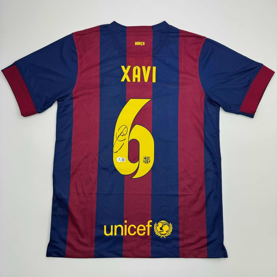 Xavi Signed FC Barcelona Jersey with Beckett COA Blue Authentic Soccer Memorabilia: Xavi Signed FC Barcelona Jersey with Beckett COA Blue Authentic Soccer Memorabilia This pre-owned FC Barcelona blue soccer jersey features the authentic autograph of Xavi. The signature has been verif