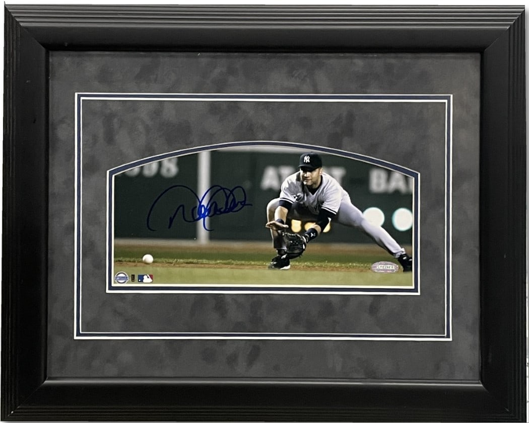 Framed 5x10 Derek Jeter Yankees Photo Signed Steiner Authenticated: Framed 5x10 Derek Jeter Yankees Photo Signed Steiner Authenticated This framed 5x10 photo features the autograph of Derek Jeter, legendary player for the New York Yankees. The photo is authenticated b